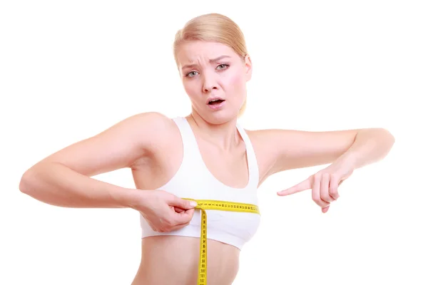 Fitness woman measuring bust — Stock Photo, Image