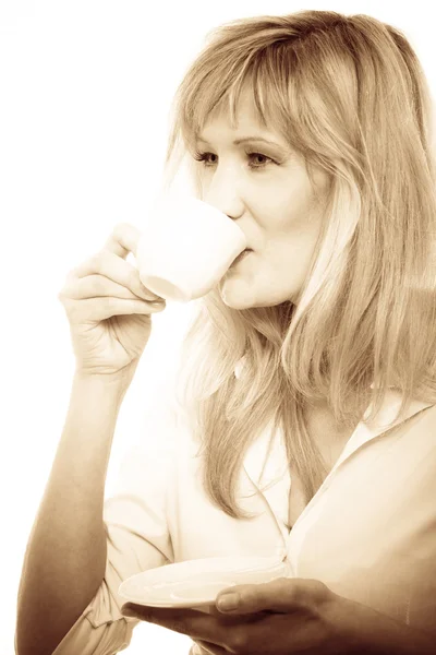 Mature woman drinking tea — Stock Photo, Image