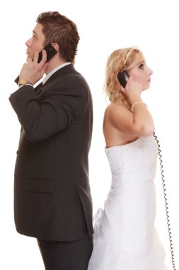 Bride and groom talking on phone clipart