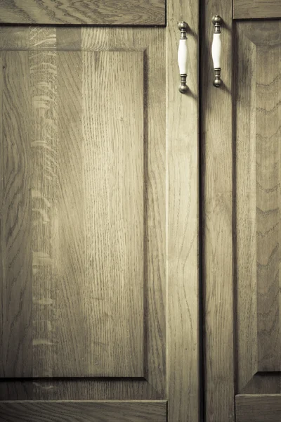 Cupboard with metal handles — Stock Photo, Image