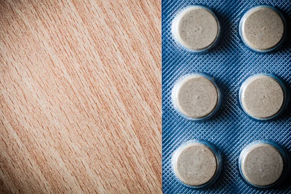 Medyczne tabletki tabletki na stole — Zdjęcie stockowe