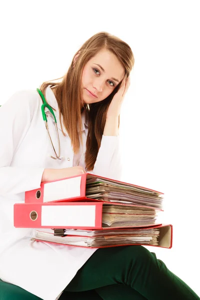 Overworked doctor woman with documents — Stock Photo, Image