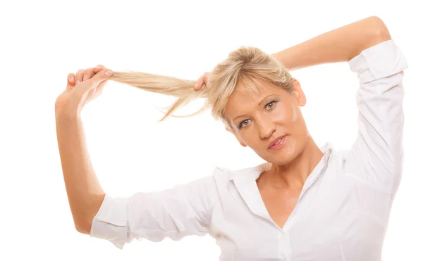Mujer madura sosteniendo su cabello —  Fotos de Stock