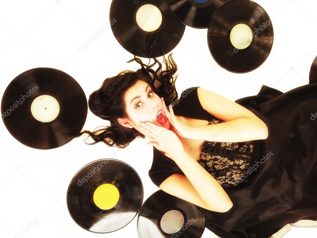 Girl with records Photo by ©Voyagerix