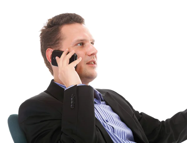 Businessman talking on mobile phone — Stock Photo, Image