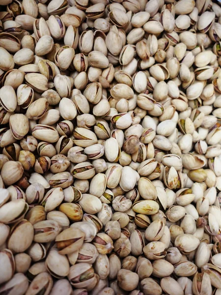 Many shelled pistachios — Stok fotoğraf