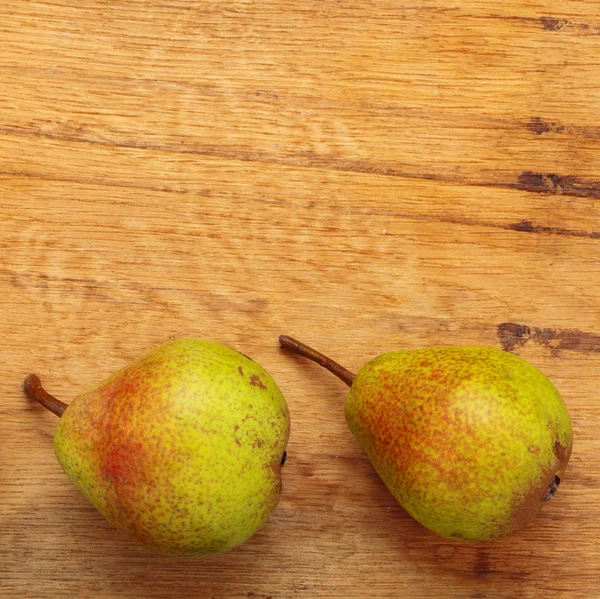 Pears fruits on wooden table — Stock Photo, Image