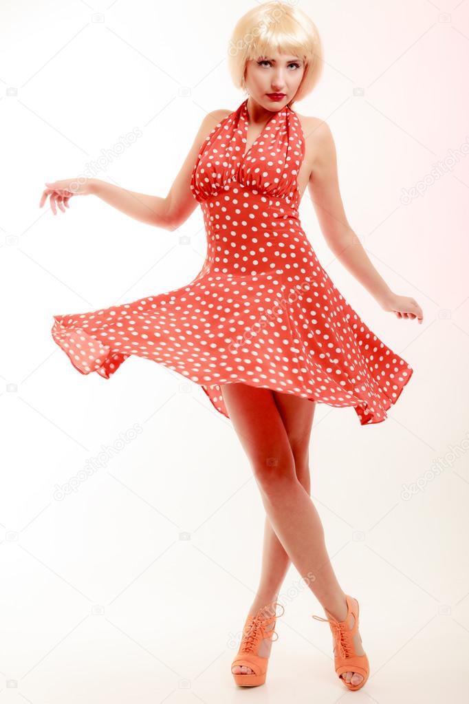 Pinup girl dancing Stock Photo by ©Voyagerix 57504747