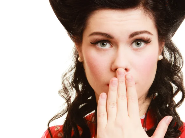 Pin-up girl covering mouth  with hand — Stock Photo, Image