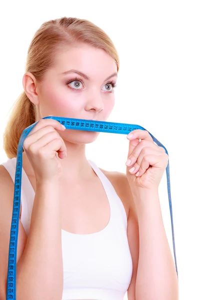 Girl covering mouth with measuring tape — Stock Photo, Image