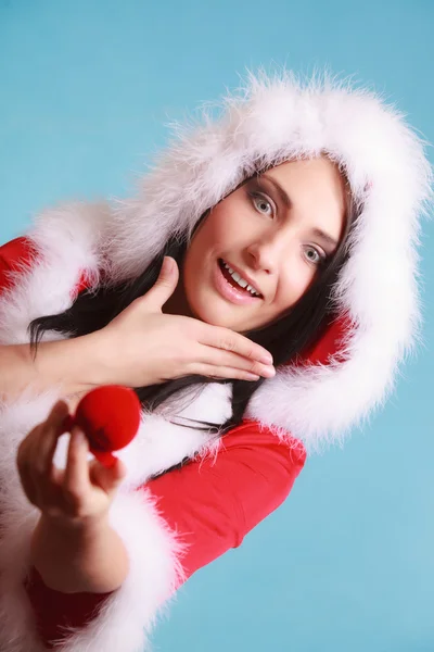 Woman opening heart shaped box — Stock Photo, Image