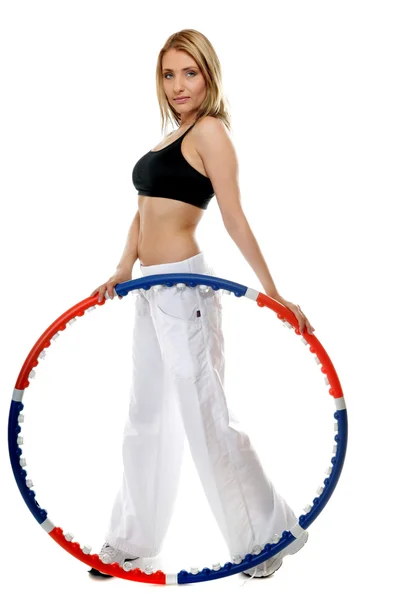 Fitness mladá žena s hula hoop — Stock fotografie