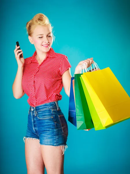 Pin-up girl with  mobile phone — Stock Photo, Image