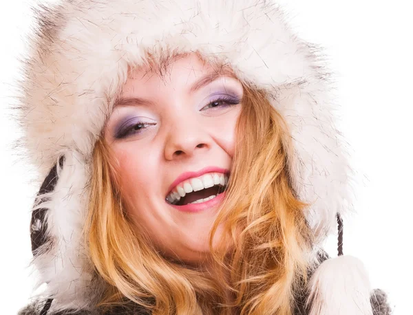Woman  in fur hat smiling — Stock Photo, Image