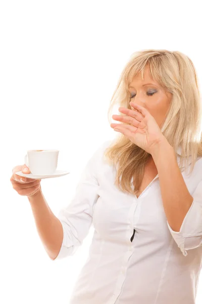 Woman holds cup of coffee — Stock Photo, Image