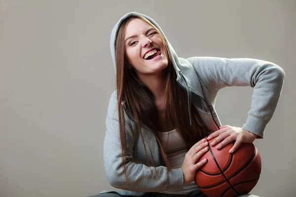 Sporty girl holding ball — Stock Photo, Image