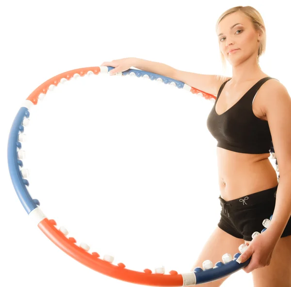 Girl doing exercise with hula hoop. — Stock Photo, Image