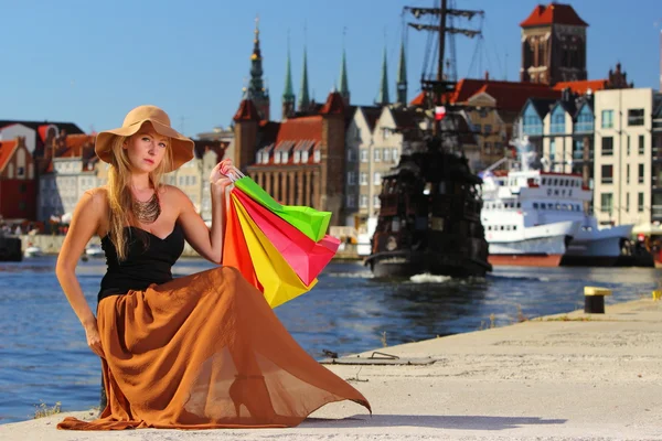 Woman holding bags — Stock Photo, Image