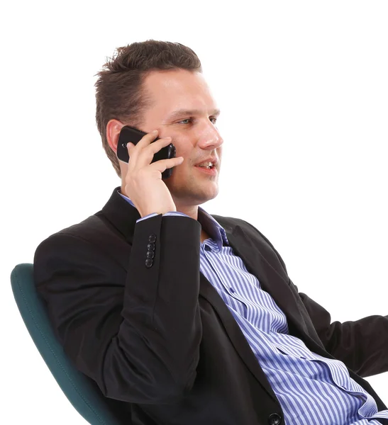 Businessman talking on mobile phone — Stock Photo, Image