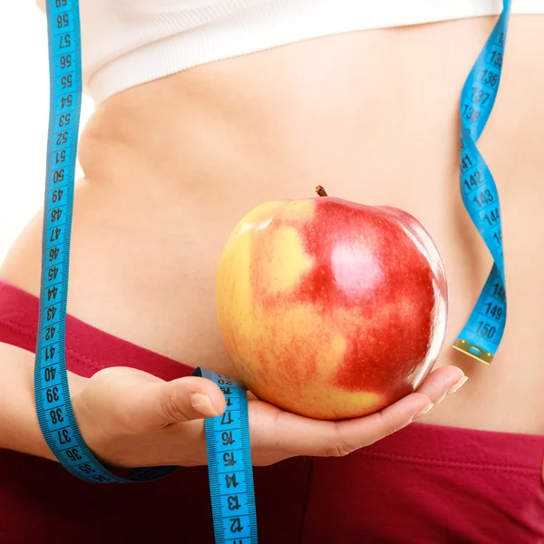 Girl holding apple — Stock Photo, Image