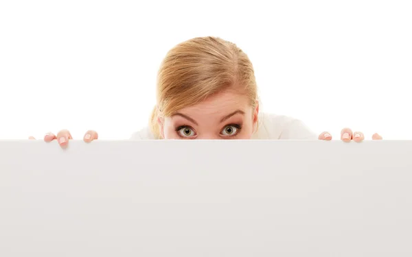 Businesswoman hiding behind blank copy space banner — Stock Photo, Image