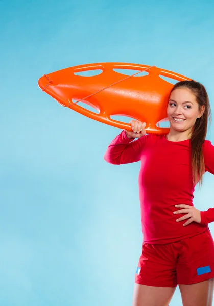 Girl lifeguard with equipment float — Stock Photo, Image