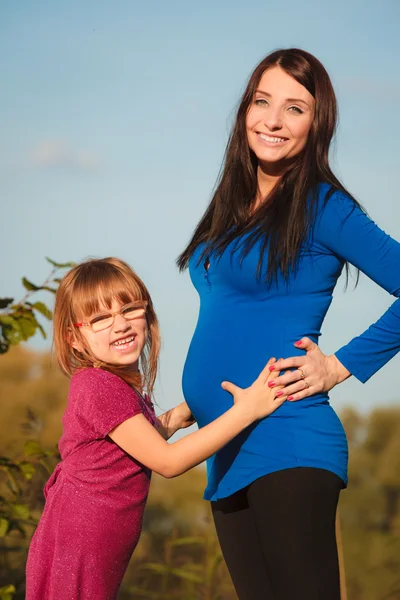 Woman with her daughter — Stock Photo, Image