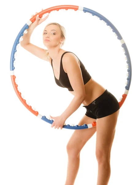 Girl doing exercise with hula hoop. — Stock Photo, Image