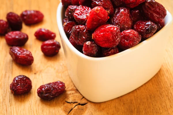 Dried cranberries in bowl — Stock Photo, Image