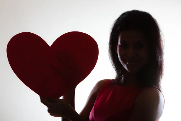 Girl holding paper red heart — Stock Photo, Image