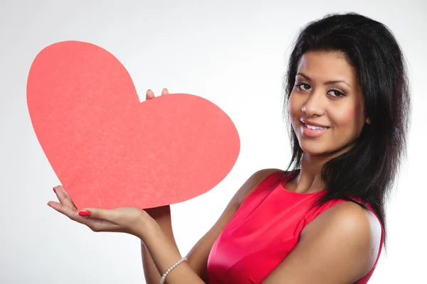 Girl holding paper red heart — Stock Photo, Image