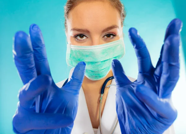 Doctor in face surgical mask — Stock Photo, Image