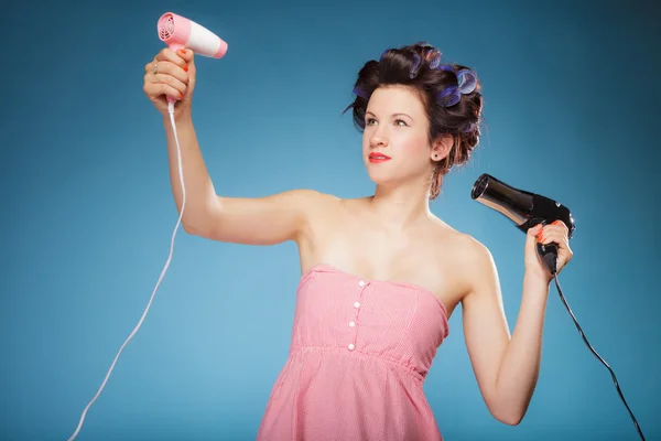 Woman styling hair — Stock Photo, Image