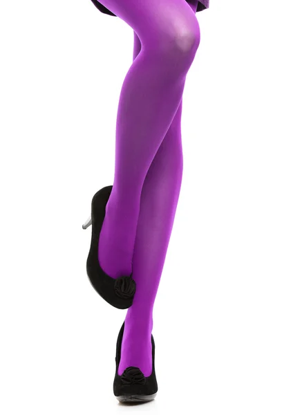 Štíhlé nohy ve fialové punčochy — Stock fotografie