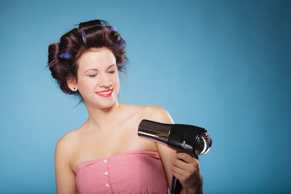 Girl holding hairdreyer — Stock Photo, Image