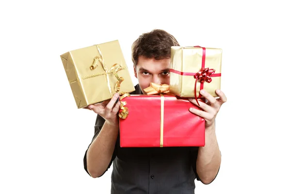 Hombre sosteniendo regalos — Foto de Stock