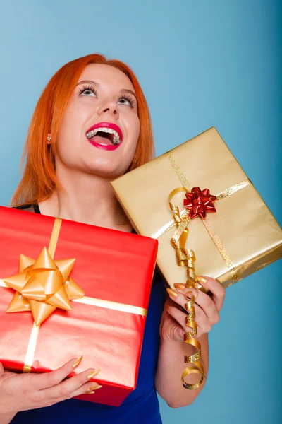 Girl holding  gift boxes — Stock Photo, Image