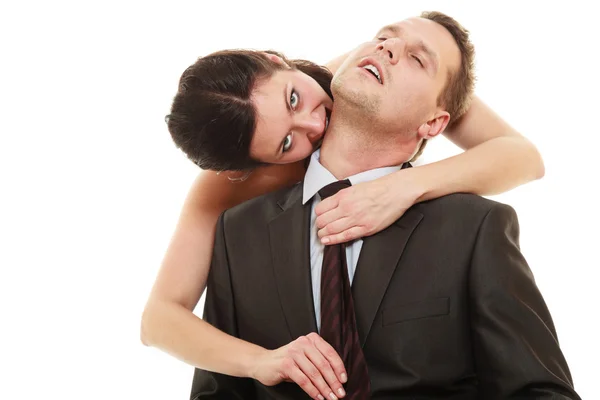 Woman pulling tie of man — Stock Photo, Image