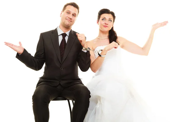 Bride and groom with handcuffs — Stock Photo, Image