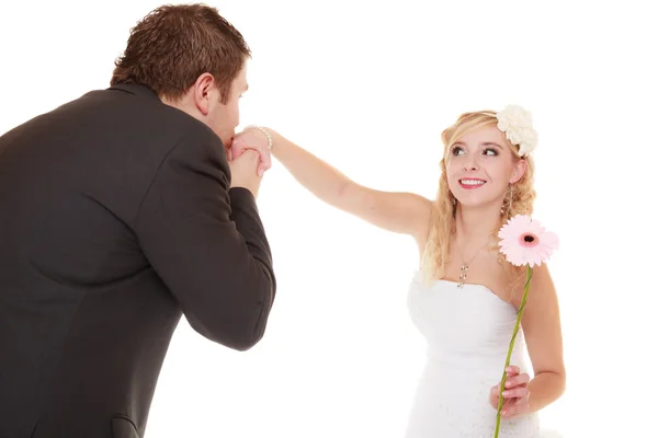 Groom kissing hand of bride — Stock Photo, Image