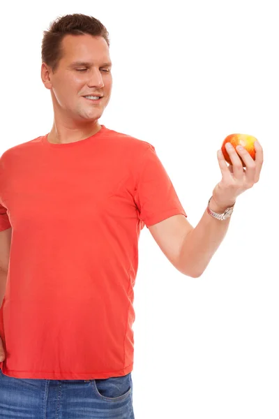 Happy man holding apple. — Stock Photo, Image