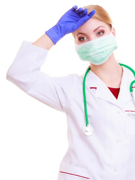 Overworked doctor or nurse woman in mask and lab coat isolated — Stock Photo, Image