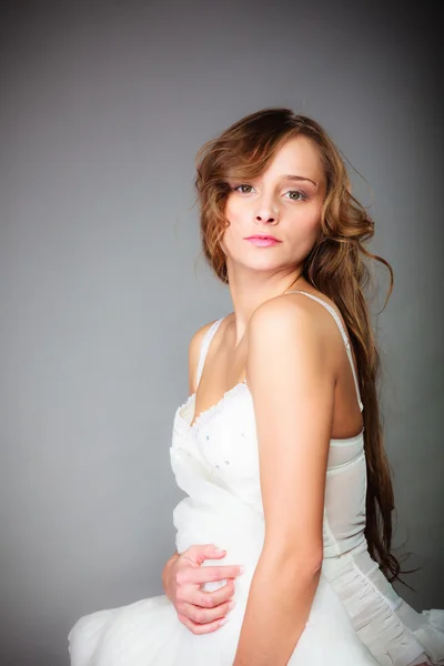 Woman posing with pillow — Stock Photo, Image