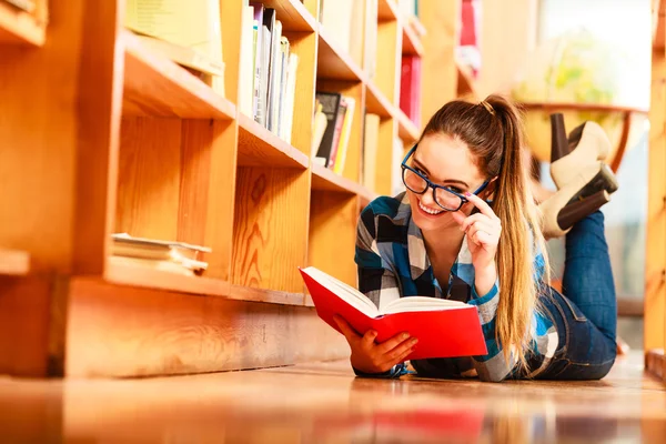 Student lying on floor Stock Image