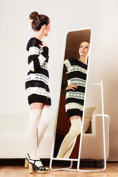 Woman trying on dress — Stock Photo, Image