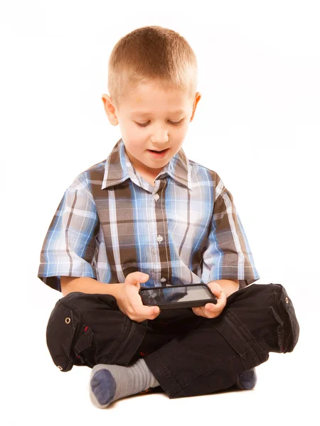 Menino brincando no smartphone — Fotografia de Stock