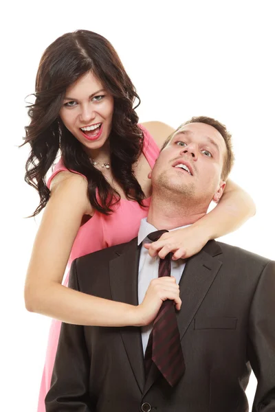 Woman pulling tie of man. — Stock Photo, Image