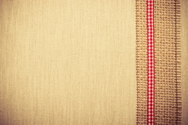 Ribbon on linen cloth — Stock Photo, Image