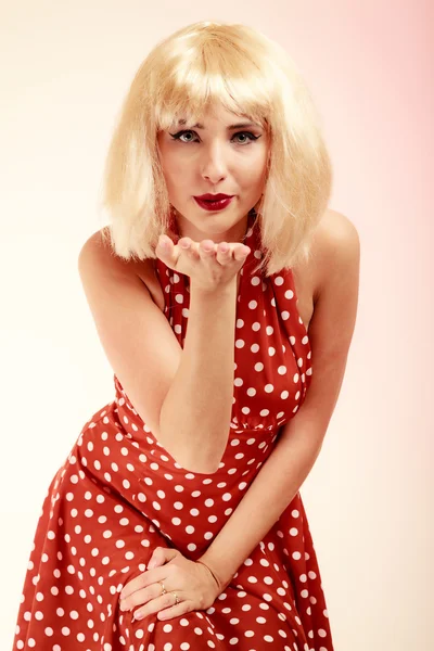 Pinup girl  blowing a kiss — Stock Photo, Image