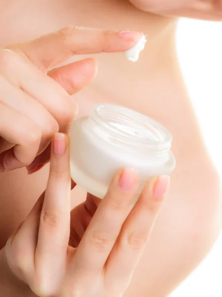 Cream in female hands — Stock Photo, Image